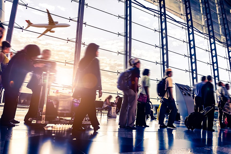 travelers at airport air travel