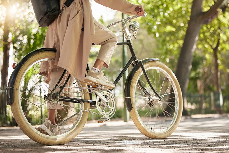 woman riding bicycle outdoors