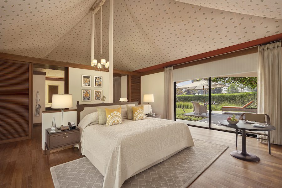 Oberoi, Vindhyavilas Wildelife Resort, Bandhavgarh luxury tent bedroom with view of garden and deck