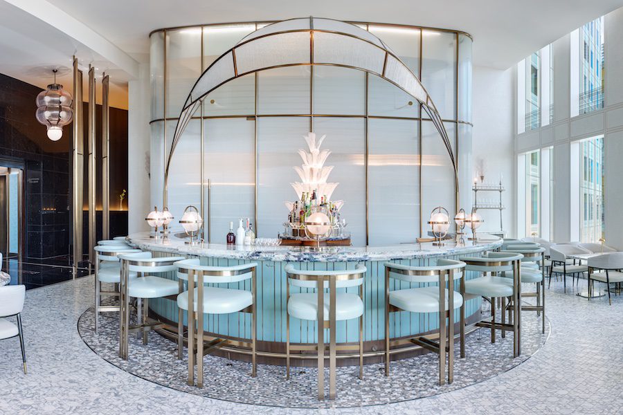 Waldorf Astoria Las Vegas Peacock Alley white palette light blue bar stools art deco