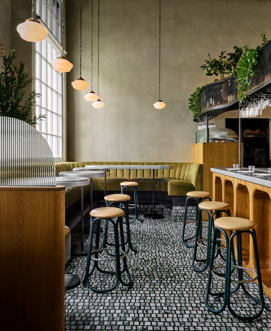 Bon Délire san francisco 1919 Beaux-Arts building industrial parisian design racetrack bar scalloped oak wood green mosaic tiles plants olive green banquette