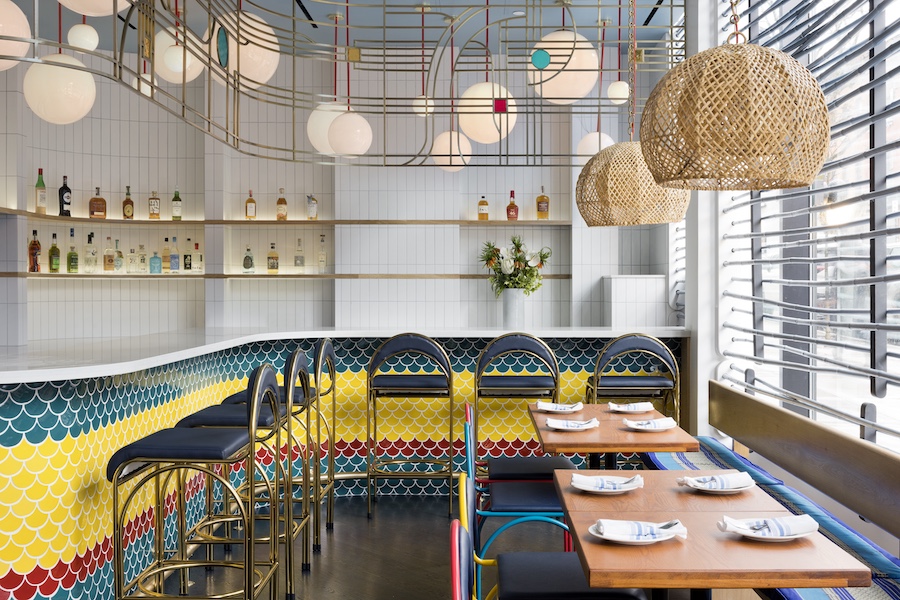 fish cheeks thai restaurant williamsburg brooklyn new york rattan light pendants red yellow blue chairs tiled bar counter