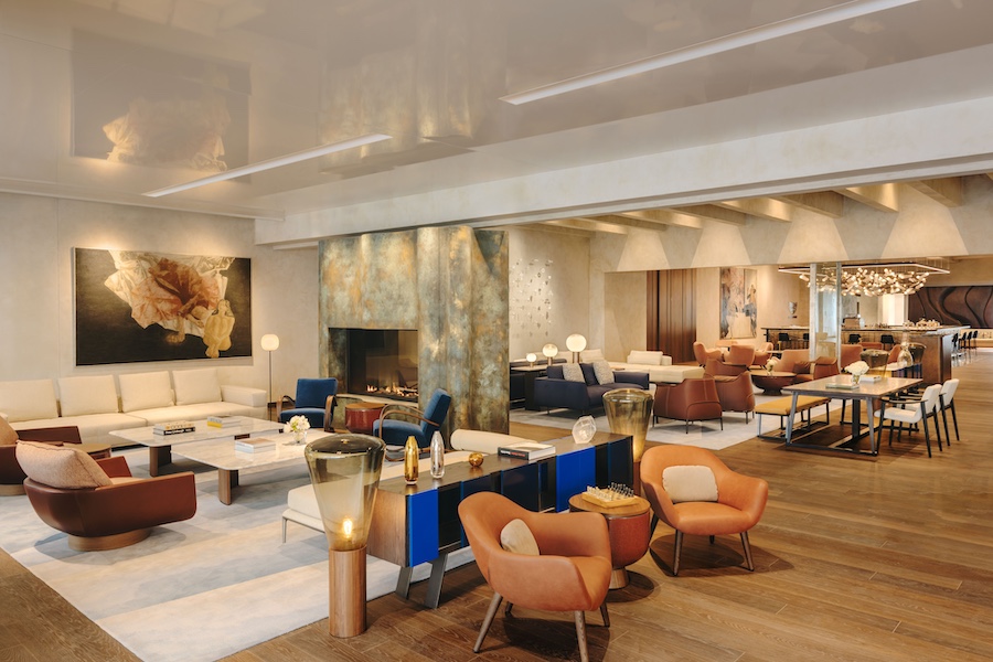 Fairmont Golden Prague lobby open fireplace wall art installation seating