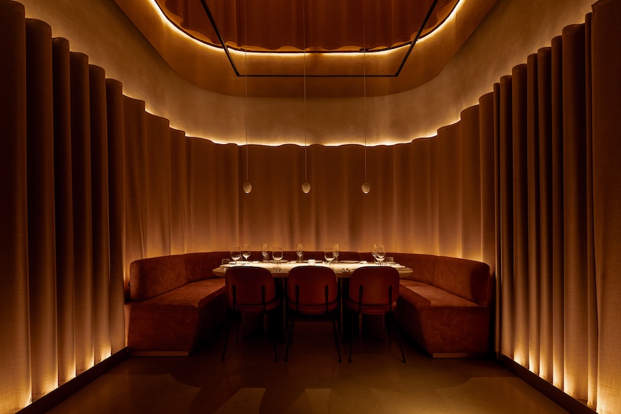 MR PORTER London steakhouse neutral palette curtains banquette underlighting