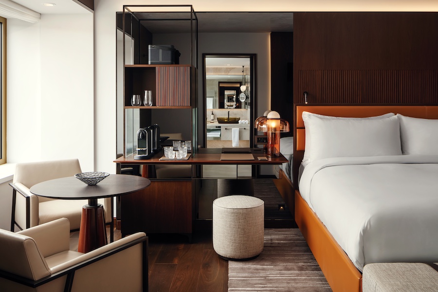 Fairmont Golden Prague - Room Detail orange bed frame