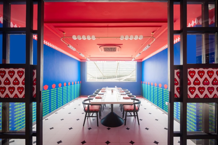 mexarosa hyderabad mexican restaurant maximalist bold red blue yellow private room red ceiling