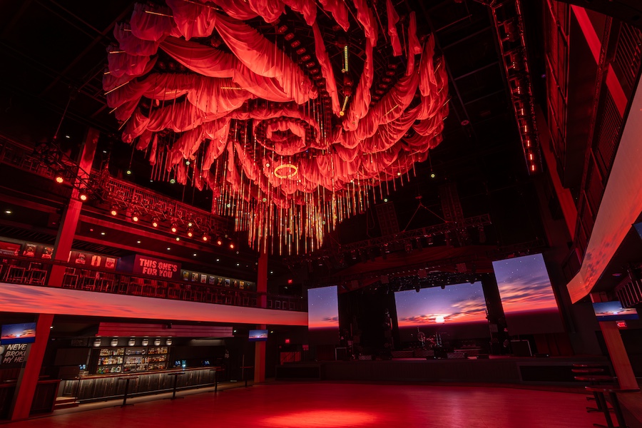 nashville category 10 multi venue entertainment space retail bar restaurant honky tonk dance floor red lights ceiling installation