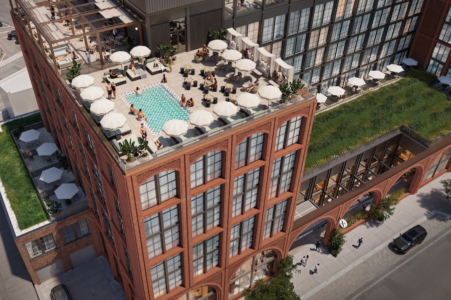 the hoxton nashville brick building arches rooftop pool greenspace