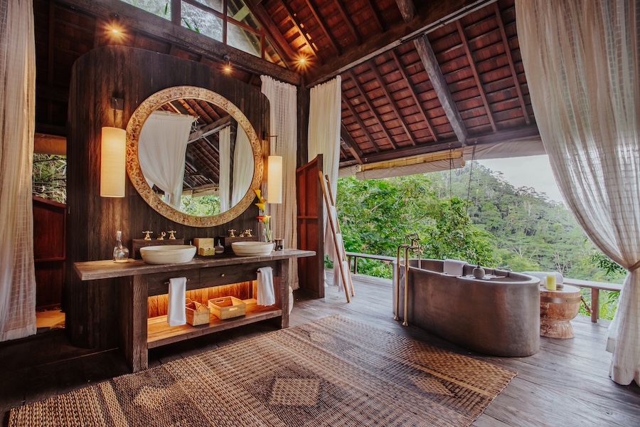 Buahan, a Banyan Tree Escape bali open air design no walls no doors adults only resort jungle treehouse bathroom bathtub mirror