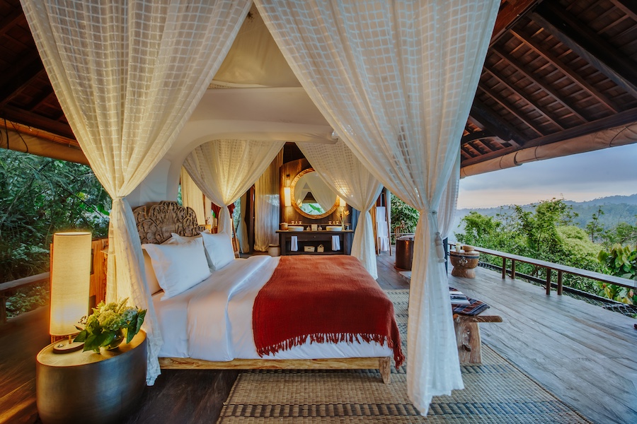 Buahan, a Banyan Tree Escape bali open air design no walls no doors adults only resort jungle treehouse guestroom bed canopy
