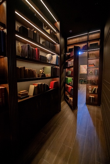 Presidente Bar Miami biblioteca secret speakeasy cocktail lounge bookshelf entrance