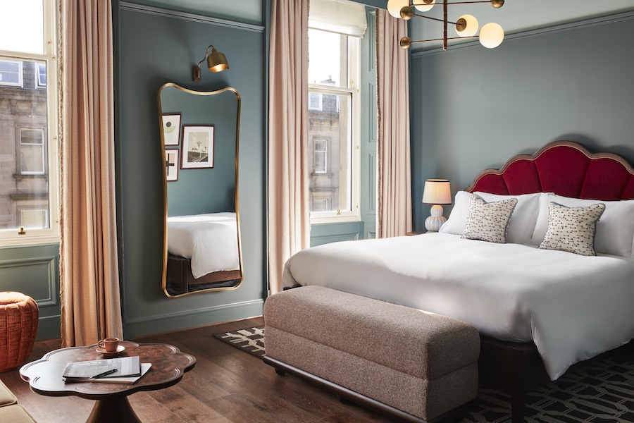 The Hoxton Edinburgh Biggy Up guestroom raspberry red headboard dusty blue walls pink curtains gold gilded mirror