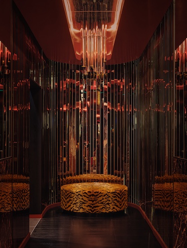 bowie supperclub speakeasy style old montreal 1980s glamour retro nightlife leopard print ottoman reflective walls