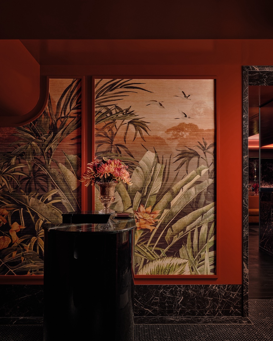 bowie supperclub speakeasy style old montreal 1980s glamour retro nightlife hostess stand tropical floral wallcovering red walls black marble