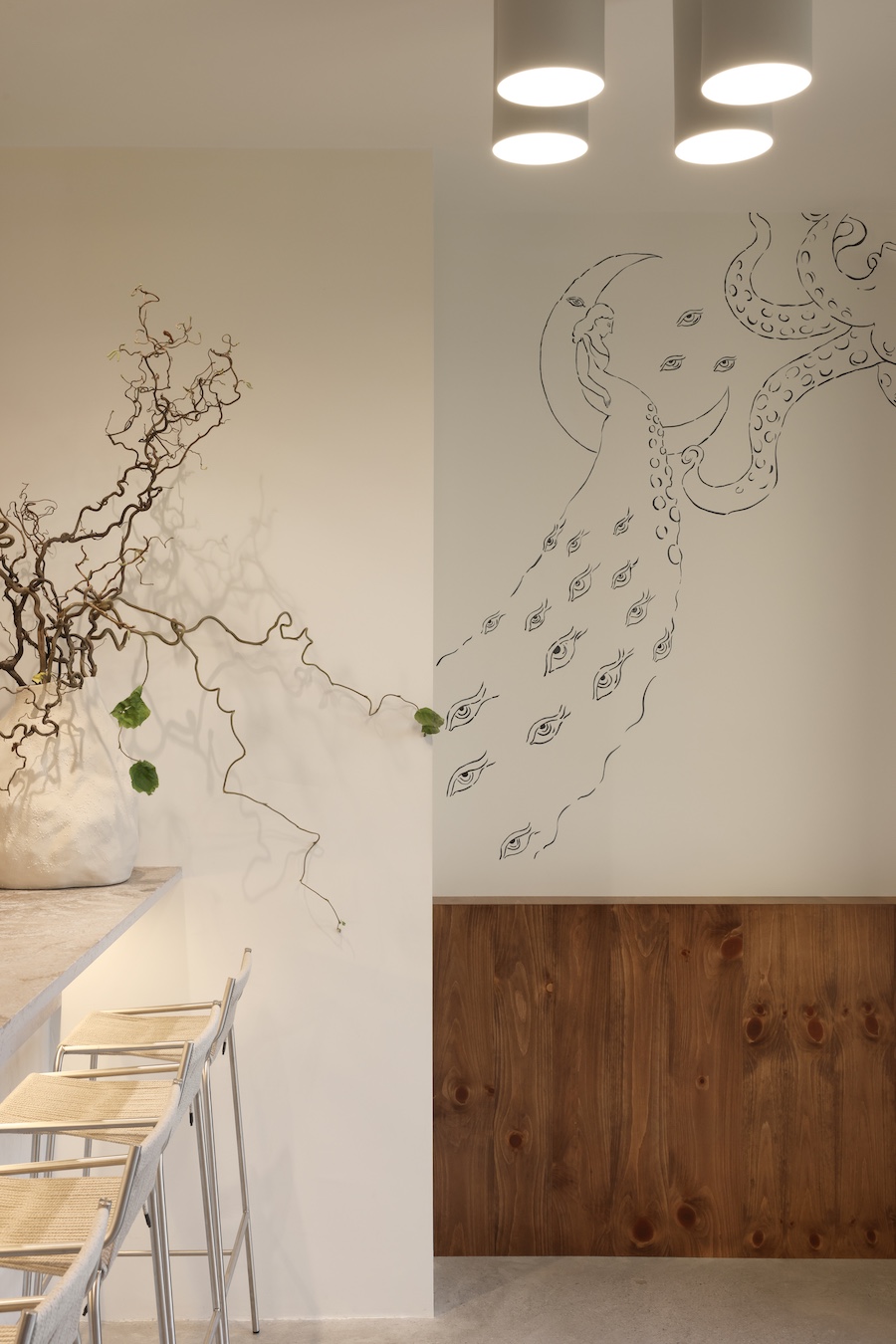 selene restaurant vancouver minimalist greek mythology mediterranean gray plaster polished concrete floors wall mural