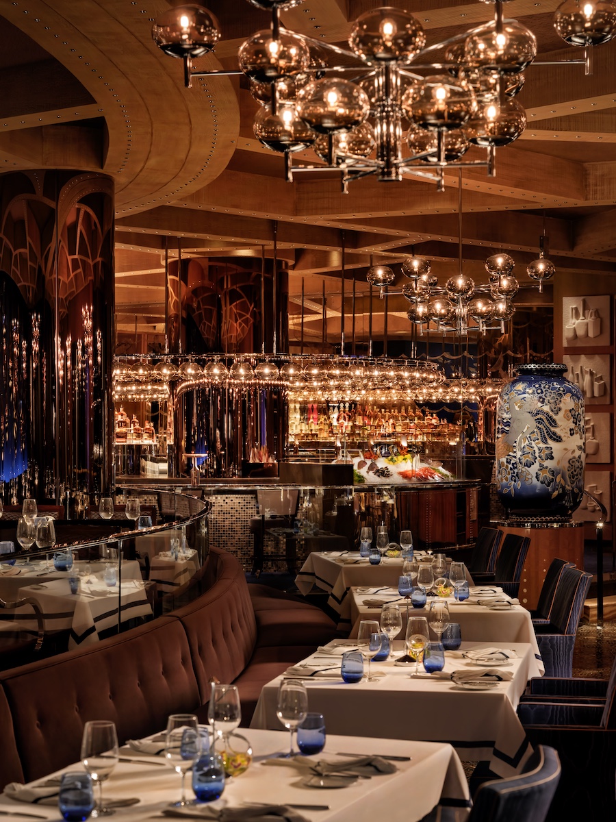 PISCES Bar & Seafare wynn las vegas seafood restaurant bar murano glass orb lighting racetrack bar white tablecloth tables