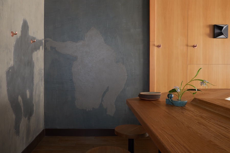 saru handroll bar san francisco sushi Kintsugi japanese philosophy minimal retrained natural palette wood car bar stools gray limewash walls gorilla