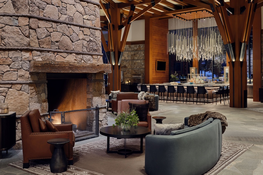 The Ritz-Carlton, Lake Tahoe Living Room Lodge Bar exposed wood beam ceiling droplet chandelier square bar fireplace seating