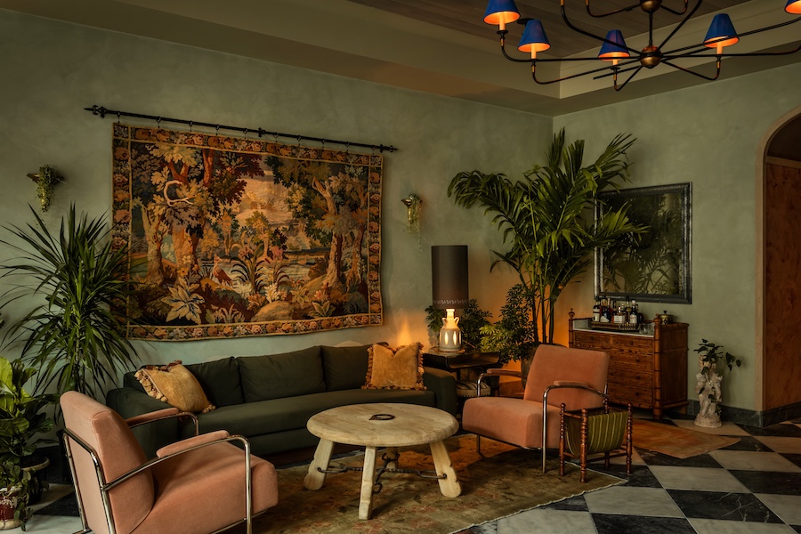 the nickel hotel charleston south carolina king street southern townhouse design lobby black white checkered flooring arched doorway seating area tapestry