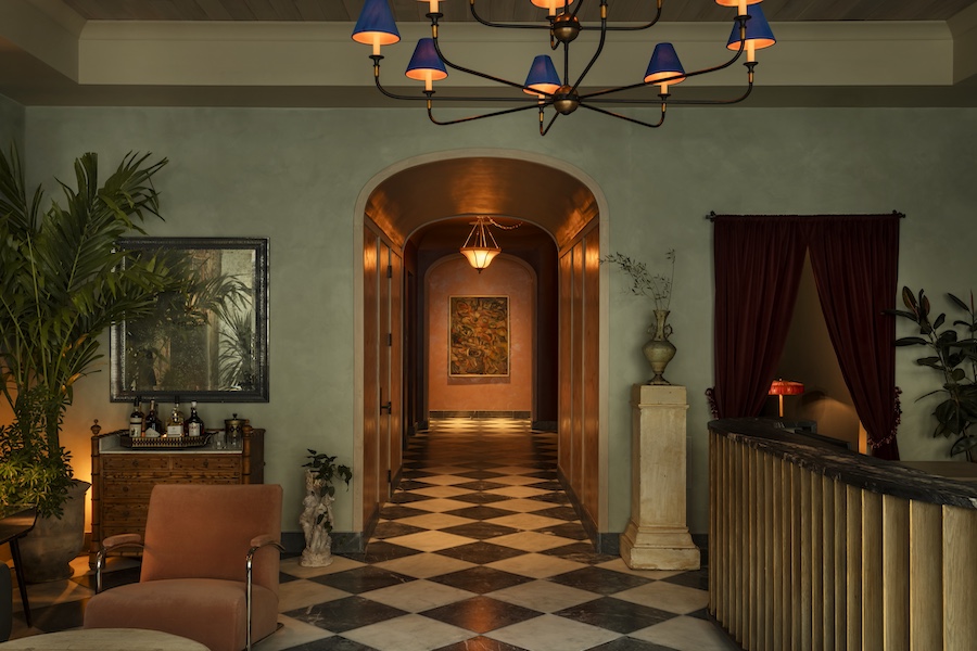 the nickel hotel charleston south carolina king street southern townhouse design lobby black white checkered flooring arched doorway