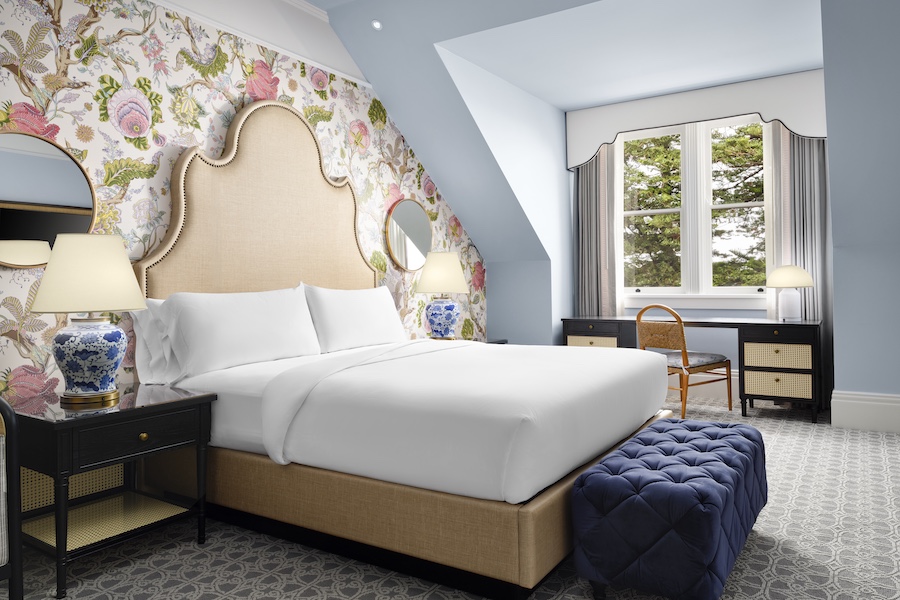 Hotel del Coronado california restoration victorian guestroom headboard floral wallpaper blue ottoman
