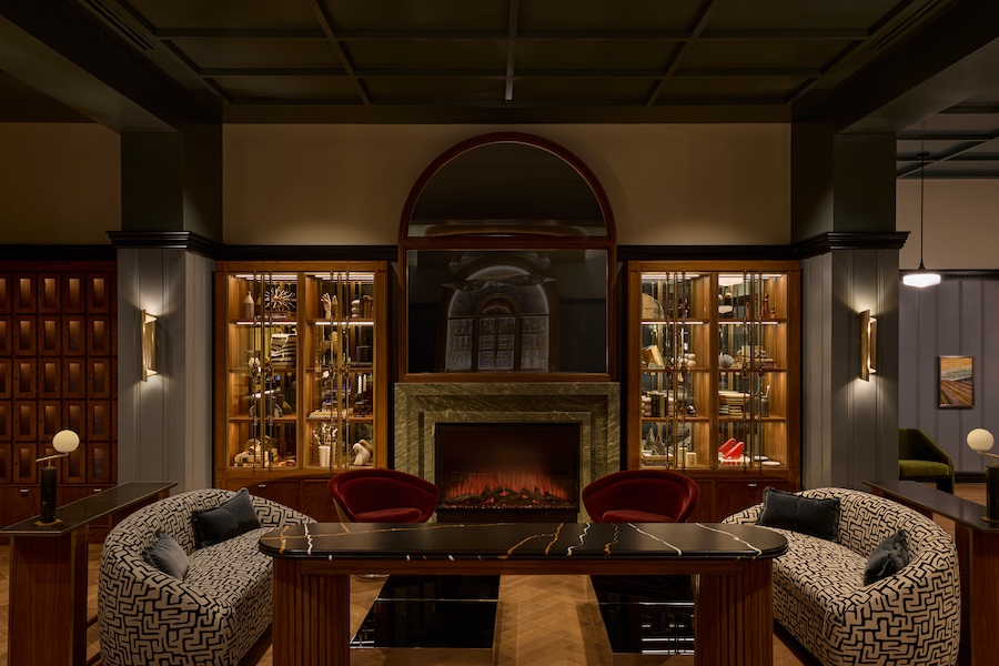 Dearborn Inn Marriott Bonvoy Autograph Collection michigan henry ford four vagabonds marble fireplace patterned sofa display shelves