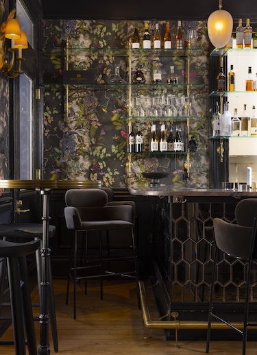 The Blackbird Hotel new orleans lower garden district french quarter old world mystique lobby black walls floral wallpaper bar