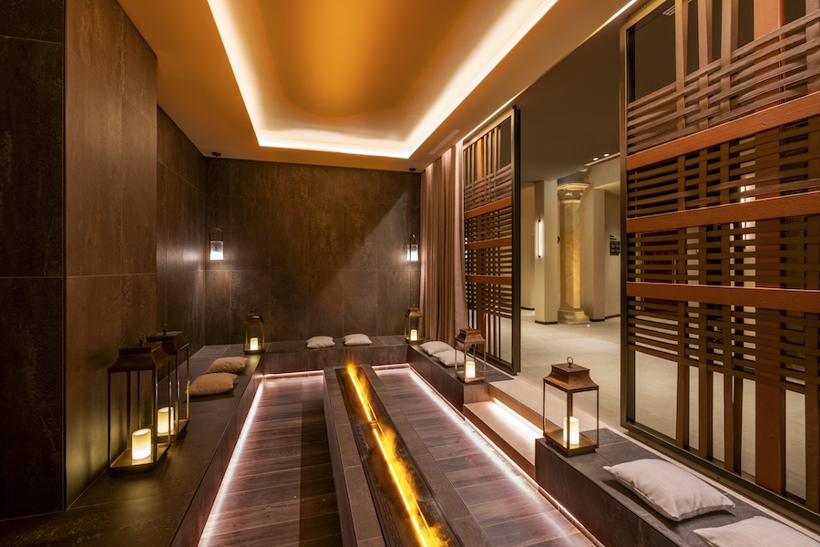 De Montel Terme Milano urban thermal spa milan italy former horse stable Scuderie De Montel fire lounge wood slatted screens sunken ceiling uplighting
