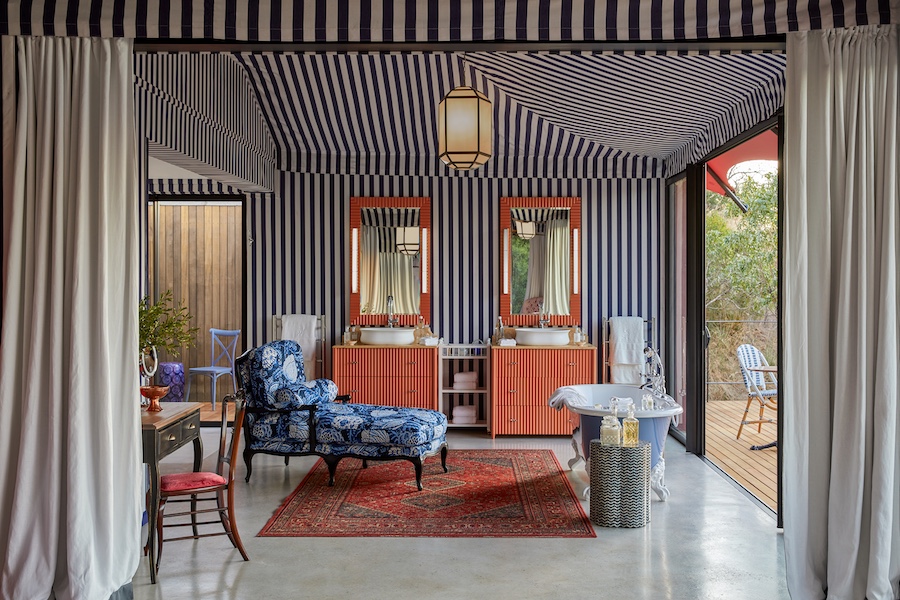 Masiya's Camp at Royal Malewane south africa outdoor safari tent suites striped tent blue floral chaise red traditional rug