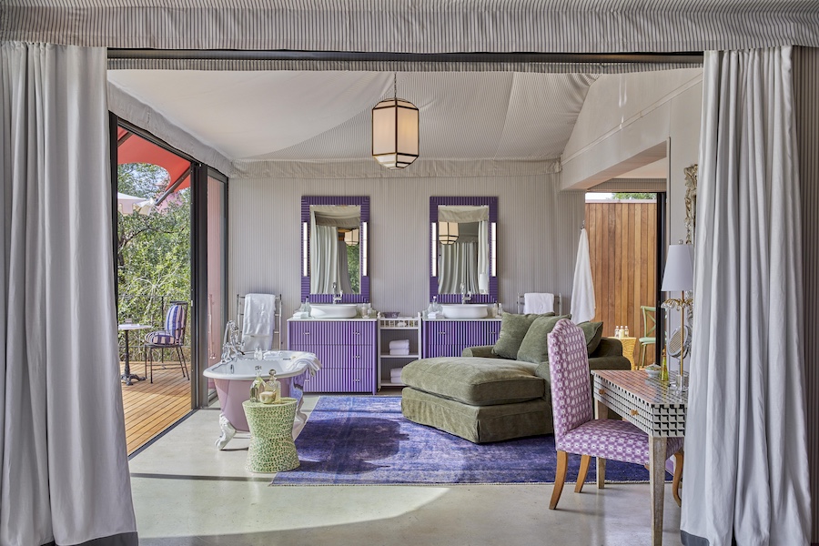 Masiya's Camp at Royal Malewane south africa outdoor safari tent suites bathroom purple vanity chair rug green lounger sofa freestanding bathtub