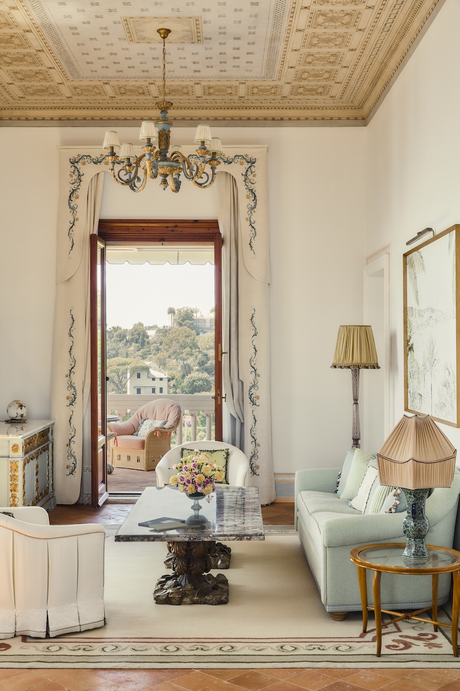 villa beatrice luguria italy italian dolce vita clifftop estate suites arch doorways windows balcony glass chandelier marble coffee table decorative ceiling