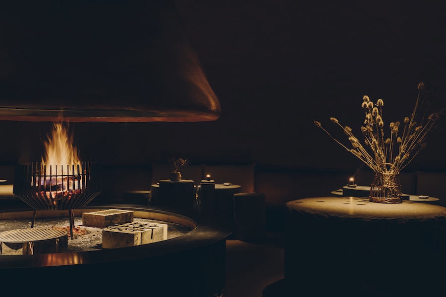 yera fine dining forestis italy dolomites carved into mountain elements natural rock fire wood dried flowers
