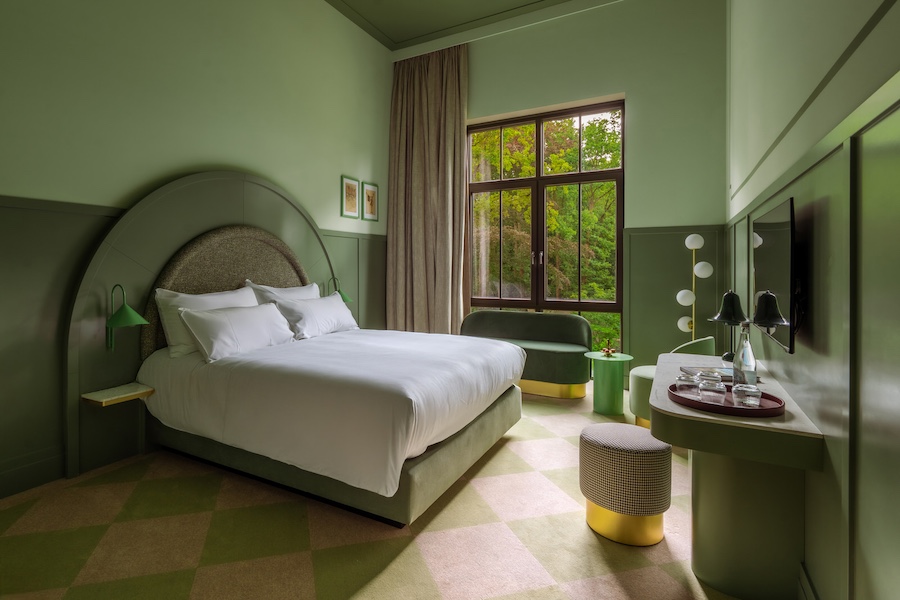 Efteling Grand Hotel the netherlands theme park green guestroom bed arched headboard