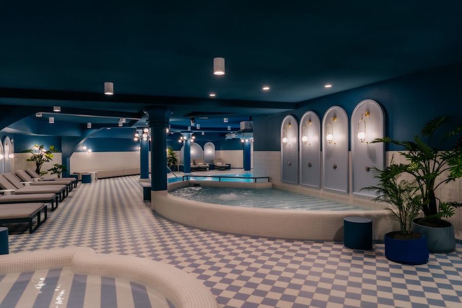 Efteling Grand Hotel the netherlands theme park blue baths plunge pool sun loungers checkered floor indoor plants