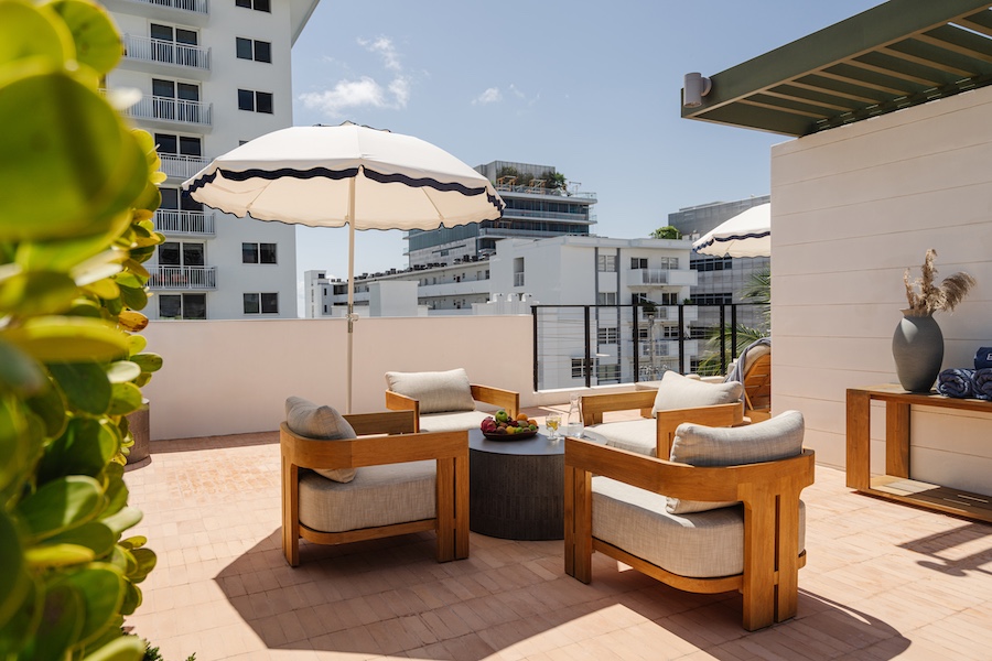 the balfour hotel miami beach morgans originals rooftop terrace outdoor chairs whtie umbrella