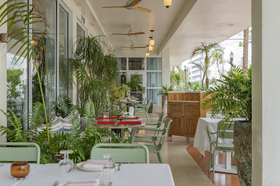 the balfour hotel miami beach morgans originals cleo restaurant outdoor terrace plants green chairs