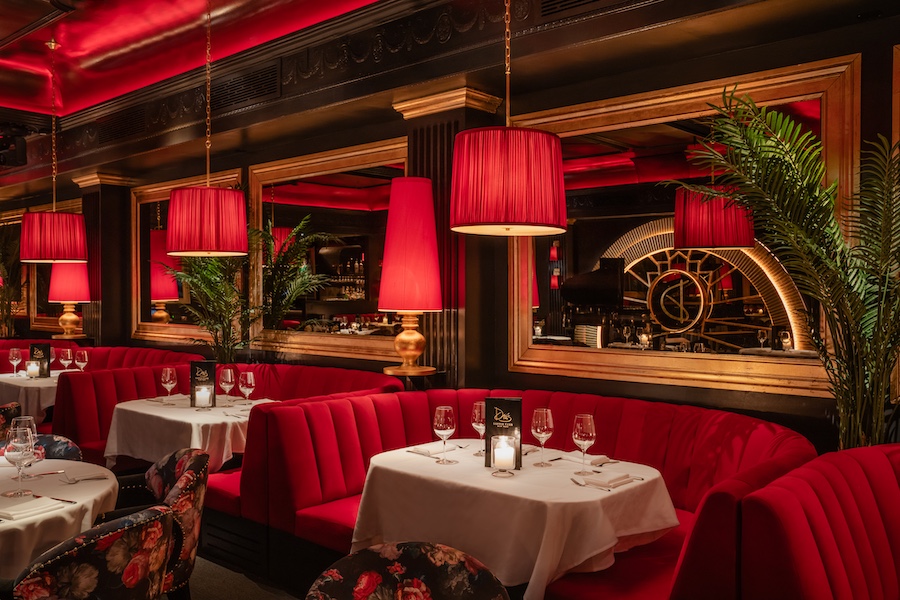 Drais Supper Club new york chelsea meatpacking jazz lounge red banquettes floral chairs red uplighting gilded mirrors indoor plants