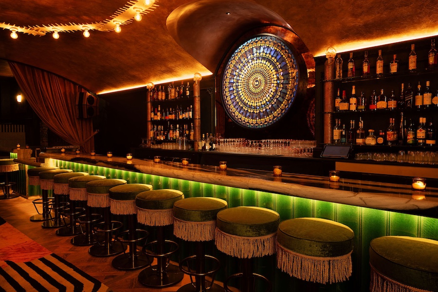 maison nur lower east side manhattan new york restaurant lounge night club bar emerald green tile velvet tassle bar stools butterfly mosaic art patina ceiling