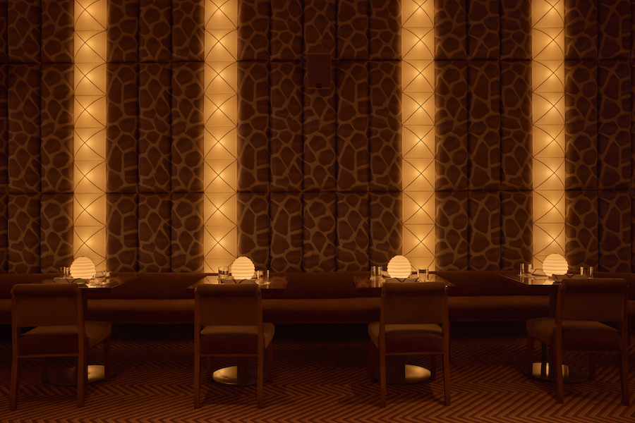 Obvio modern supper club cocktail bar Manhattan new york cinematic interiors padded walls giraffe print brocade vertical lights