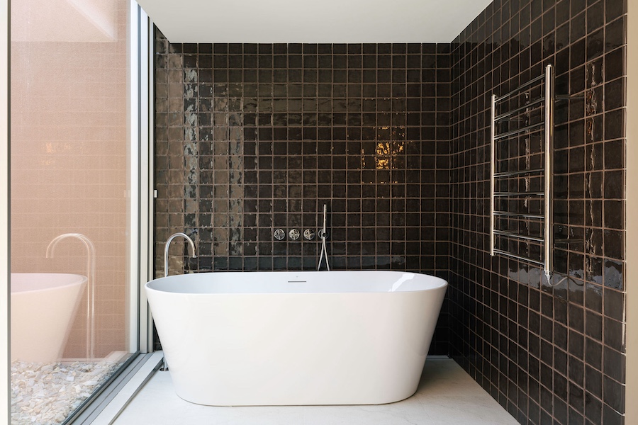 Octant Douro house collection Castelo de Paiva Portugal freestanding bathtub dark red square tiles
