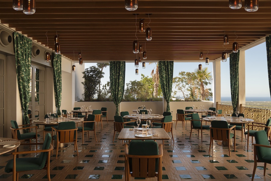 Vista Ostuni puglia italy 14th century palazzo outdoor terrace Berton al Vista fine dining green chairs curtains floor tile slatted wood ceiling