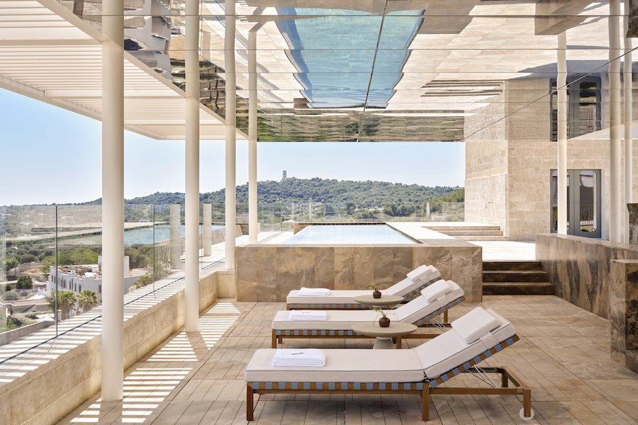 Vista Ostuni puglia italy 14th century palazzo vaulted ceilings outdoor pool deck infinity pool sun loungers mirrored ceiling