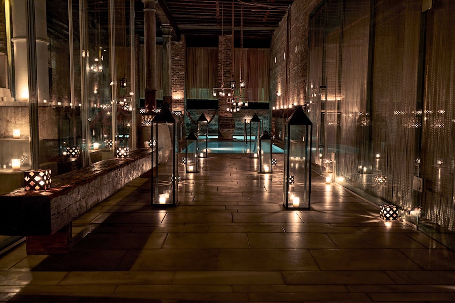 AIRE Ancient Baths Tribeca new york manhattan thermal plunge pools saunas walkway candlelights