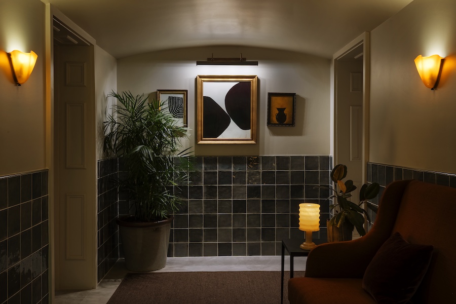 the douglas savannah georgia restored townhouse 1853 hallway green square tiles wall art indoor plants