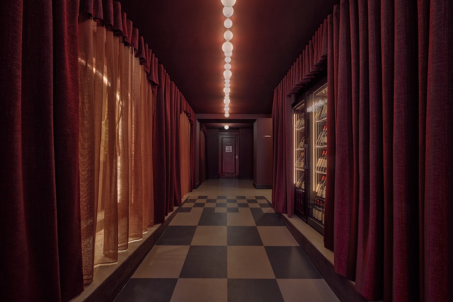 vertigo cafe Amsterdam Vondelpark Pavilion alfred hitchcock movie red curtain black and white checkerboard floor sheer curtains
