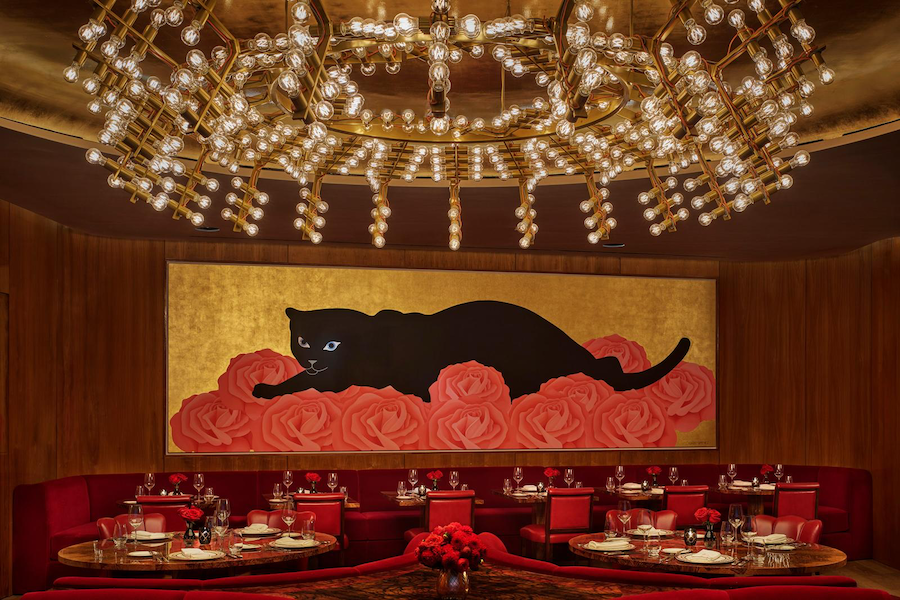 faena new york hotel la boca black panther cat wall mural red roses large chandelier red dining chairs banquettes