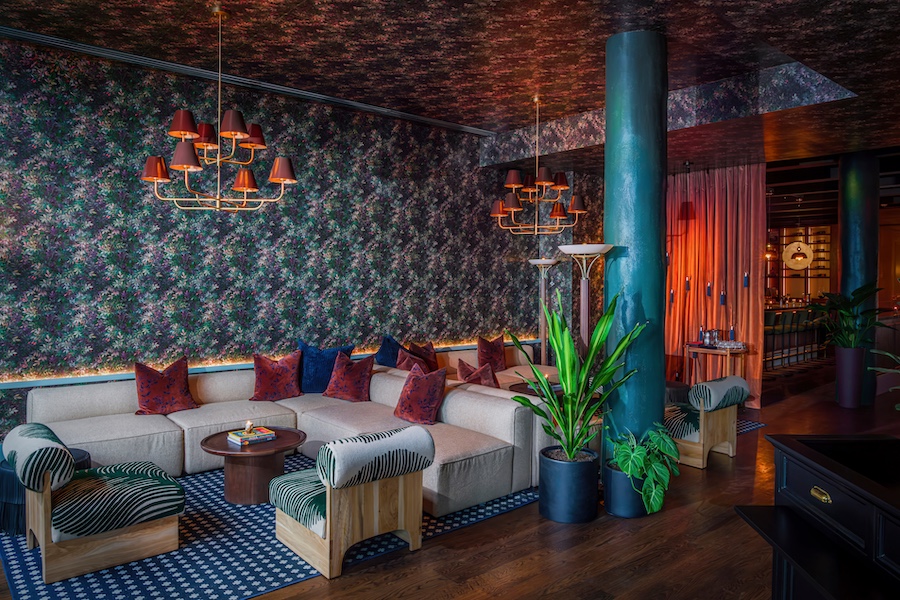 passerine bar new york manhattan flatiron indian restaurant jewel tones floral wallpaper teal wall paint column gray sofa red velvet cushions