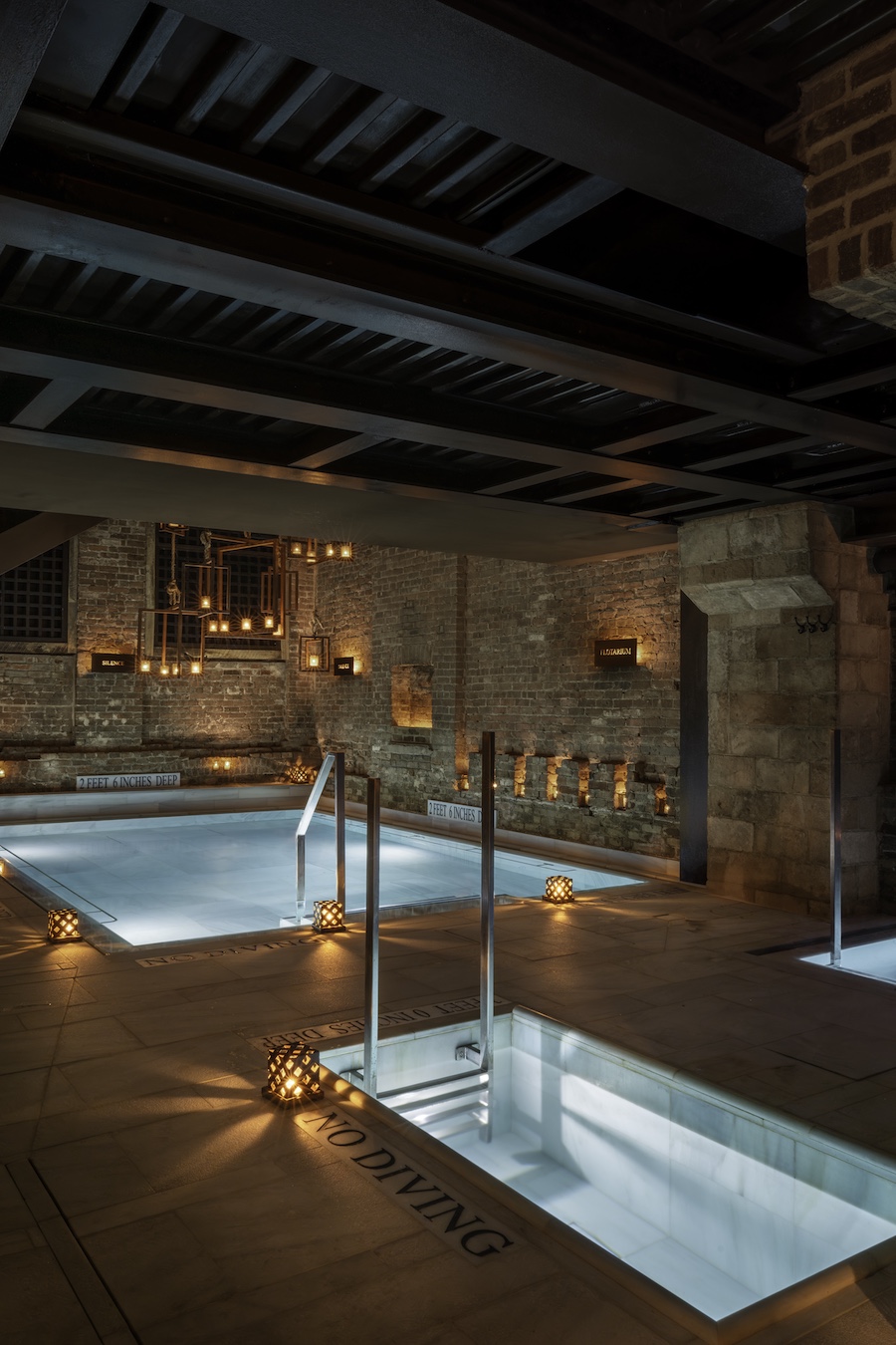 AIRE Ancient Baths Tribeca new york manhattan thermal plunge pools saunas hot plunge cold plunge ice bath columns exposed brick saltwater floating bath