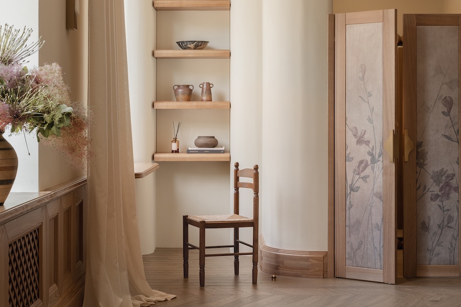 love by the moon kyiv boutique clothing retail store light oak wood white sheer curtains floral partition wood chair shelving dry flowers