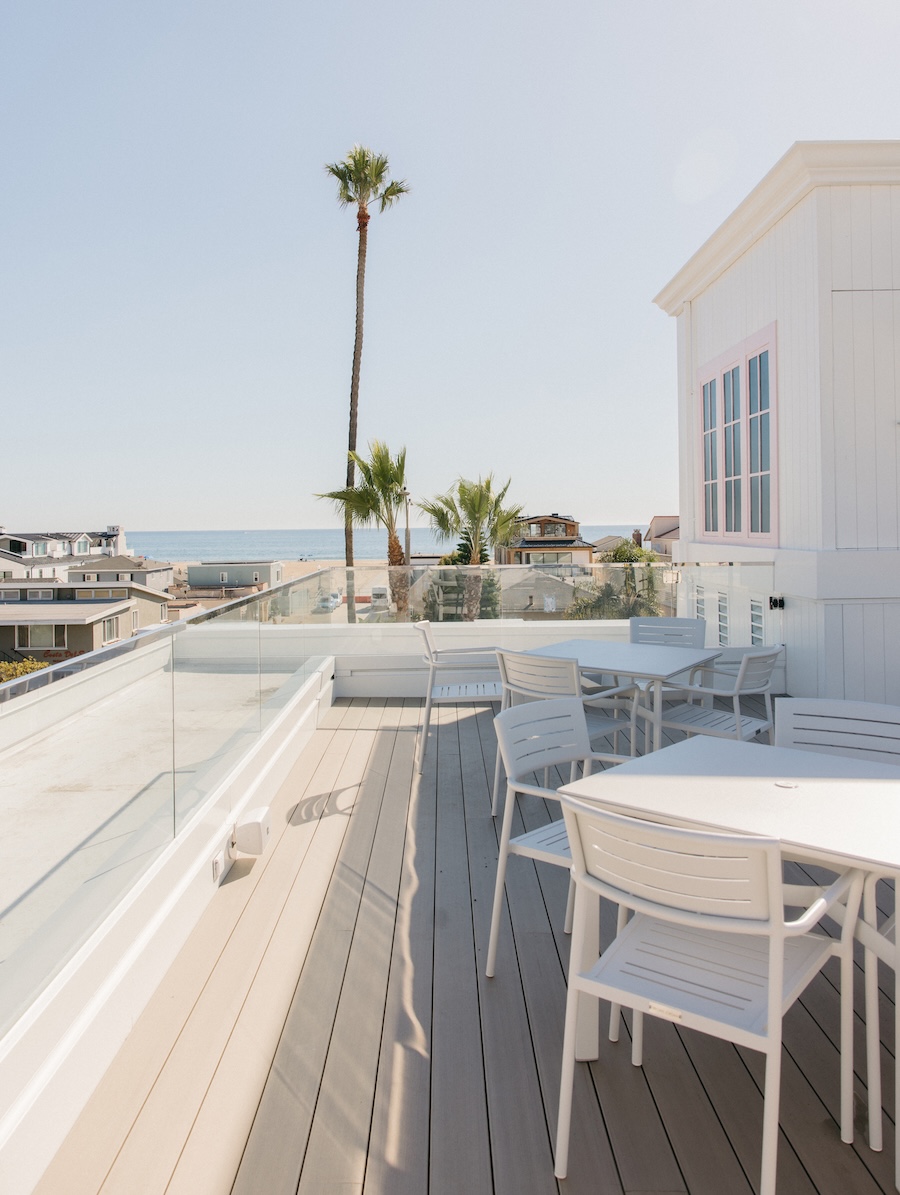 Bay Shores Hotel newport beach california coastal design white chairs table outdoor terrace rooftop
